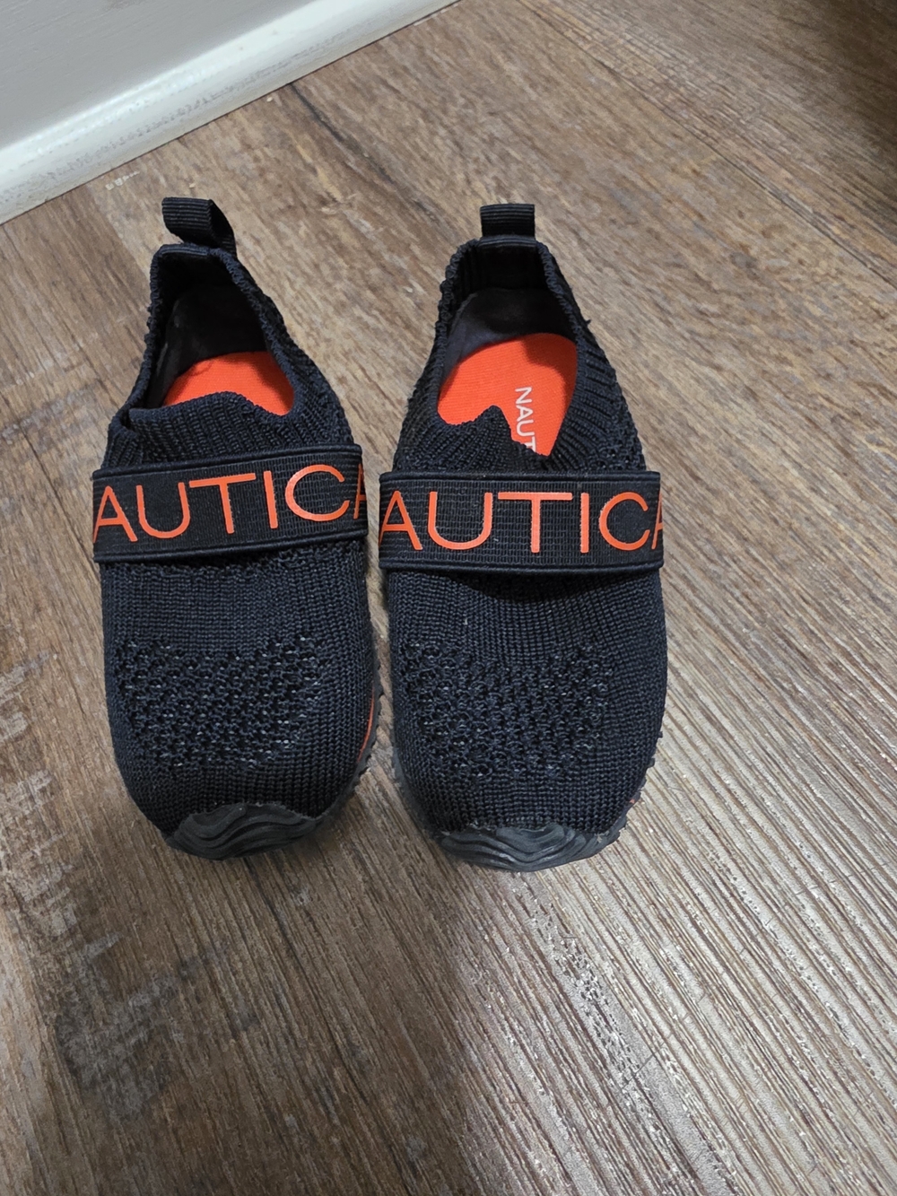 Nautica Kids Black Slip-On Sneakers with Orange Accents